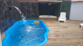 Casa piscina e hidromassagem